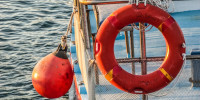 PFD and buoy on board of boat