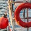 PFD and buoy on board of boat