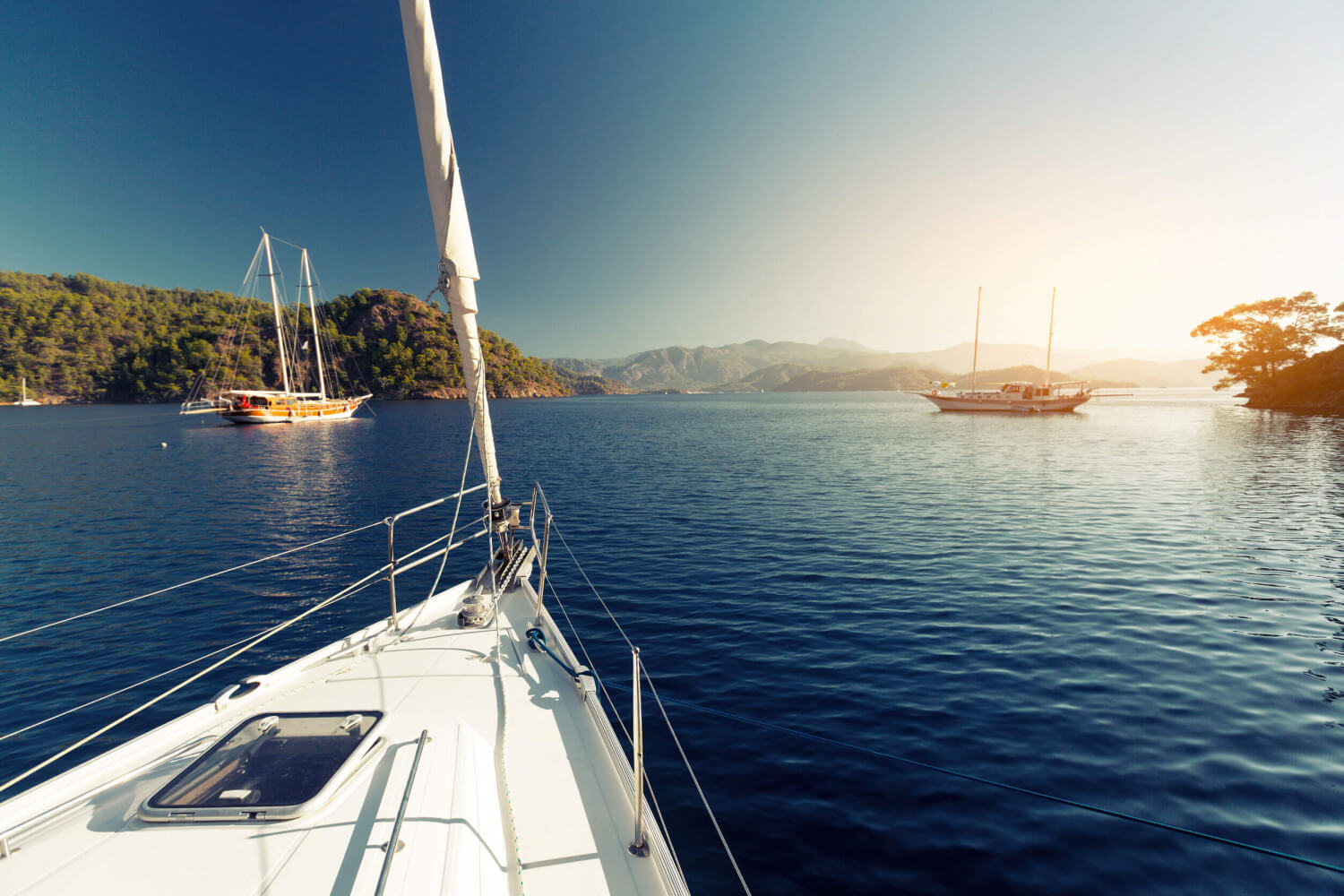 Sailboat at anchor for free in protected waters with a couple of others as well