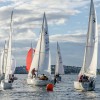 Sailing regatta with dozen sailboats in race
