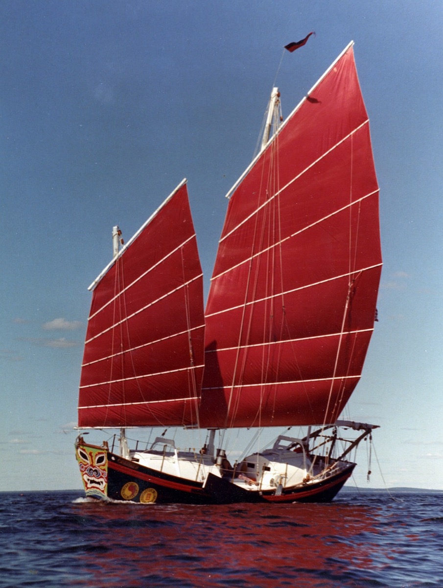 Chinese Junk sailboat with red sails