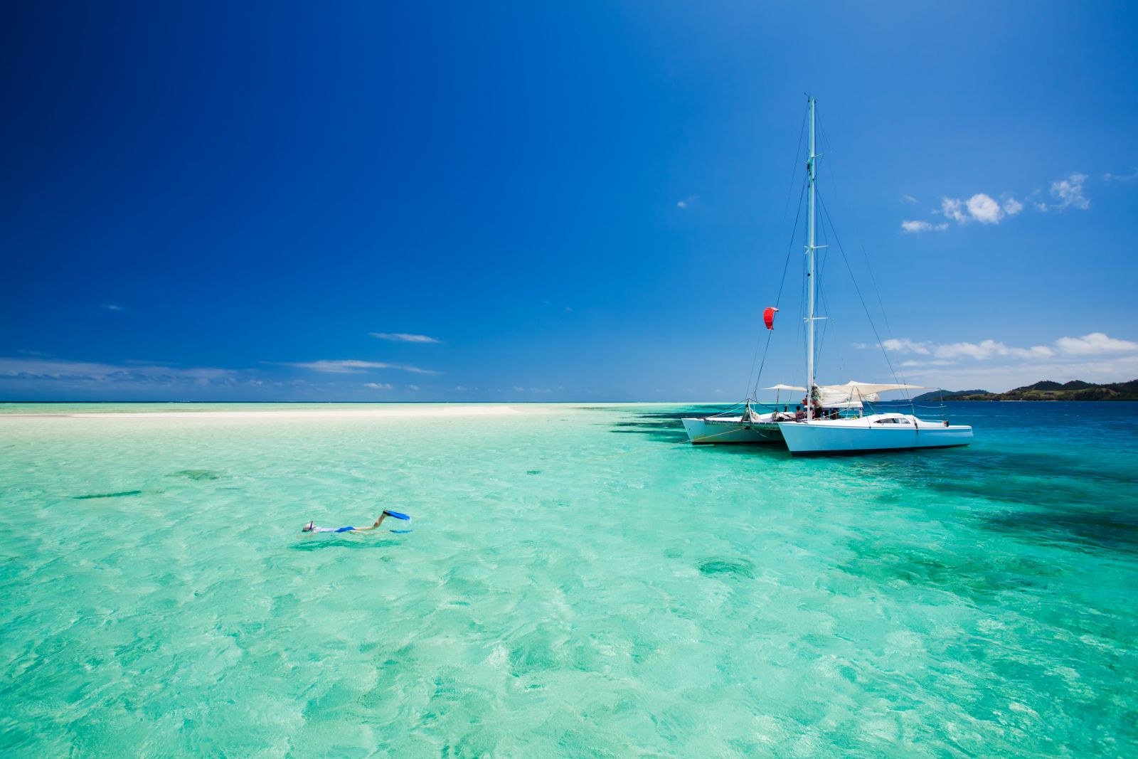 sailing on a catamaran around the world