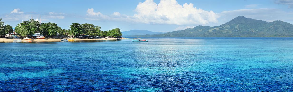 Island in coastal sea of Bunaken, Indonesia