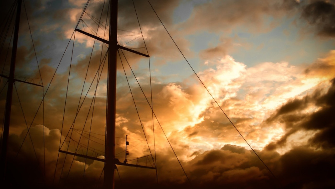 Sunset with clouds and mast