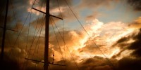 Sunset with clouds and mast